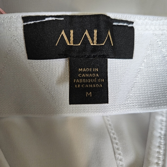 White | ALALA | Perforated Cross Back Sport Bra - Picture 6 of 7